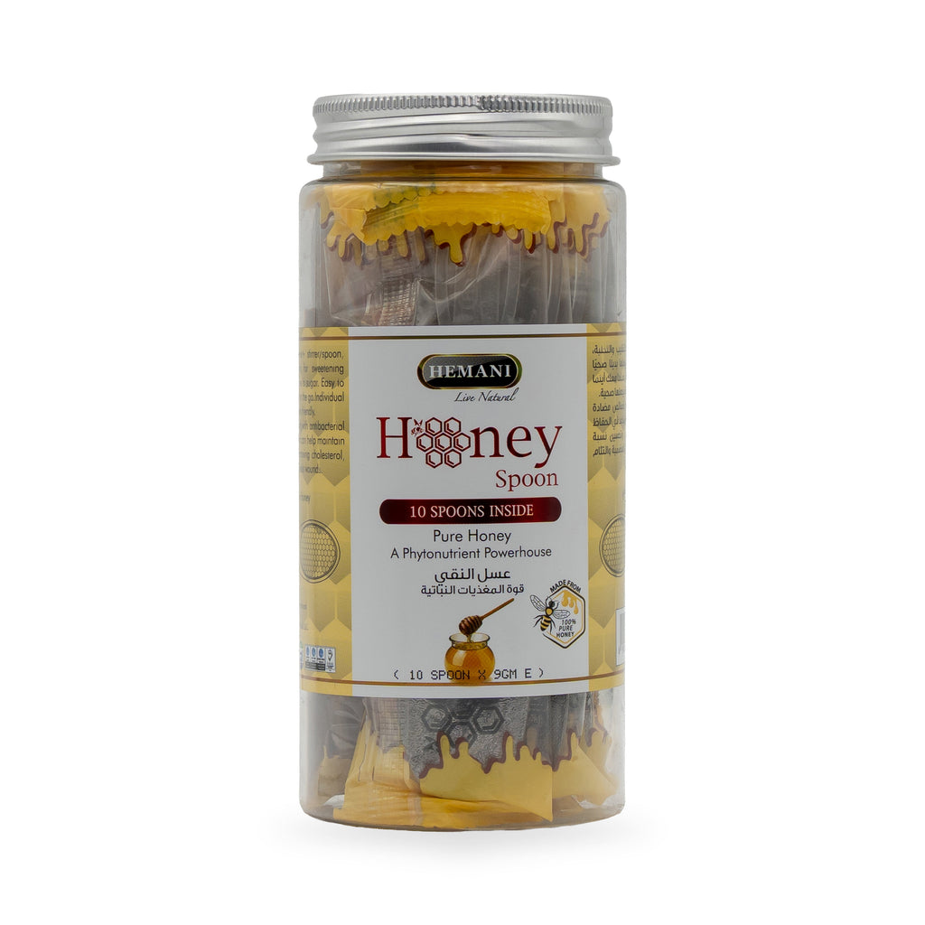 مرطبان ملعقة من العسل النقي
